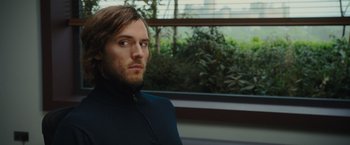 Movie still from “Me Before You” (2016), directed by Thea Sharrock – A person with long hair; Close Up shot, Over the shoulder angle