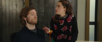 Movie still from “Me Before You” (2016), directed by Thea Sharrock – A man and a woman looking at each other; Medium shot, Over the shoulder angle