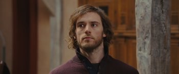 Movie still from “Me Before You” (2016), directed by Thea Sharrock – A person with long hair; Close Up shot, Over the shoulder angle