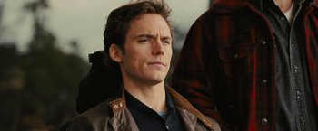 Movie still from “Me Before You” (2016), directed by Thea Sharrock – A person wearing a jacket; Close Up shot, Over the shoulder angle