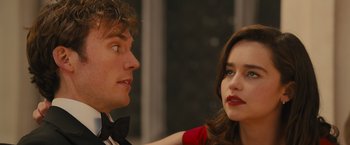 Movie still from “Me Before You” (2016), directed by Thea Sharrock – A man and a woman are looking at one another; Close Up shot, Over the shoulder angle