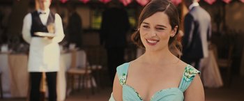 Movie still from “Me Before You” (2016), directed by Thea Sharrock – A person wearing a dress; Close Up shot, Over the shoulder angle