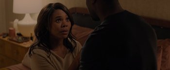 Movie still from “Me Time” (2022), directed by John Hamburg – A woman sitting next to a man on a bed; Close Up shot, Over the shoulder angle