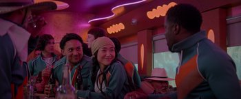 Movie still from “Me Time” (2022), directed by John Hamburg – A group of people sitting in a bus; Medium shot, Over the shoulder angle