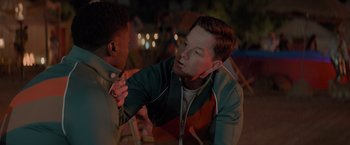 Movie still from “Me Time” (2022), directed by John Hamburg – A man with his hands on his chest while another man looks at him; Close Up shot, Over the shoulder angle