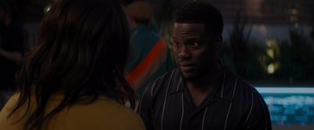 Movie still from “Me Time” (2022), directed by John Hamburg – A person talking to another person; Close Up shot, Over the shoulder angle