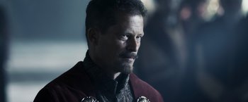 Movie still from “Medieval” (2022), directed by Petr Jákl – A person with a beard; Close Up shot, Low angle