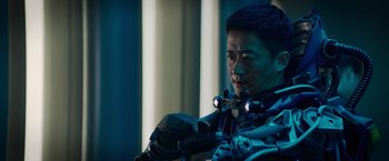 Movie still from “Meg 2: The Trench” (2023), directed by Ben Wheatley – A man with a gun in his hand; Close Up shot, Over the shoulder angle