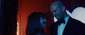 Movie still from “Meg 2: The Trench” (2023), directed by Ben Wheatley – A man and a woman are looking at one another; Close Up shot, Over the shoulder angle