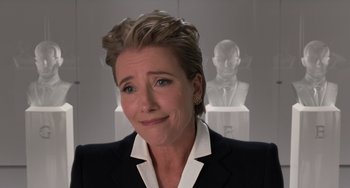 Movie still from “Men in Black 3” (2012), directed by Barry Sonnenfeld – A woman in a black suit and white shirt; Close Up shot, Over the shoulder angle