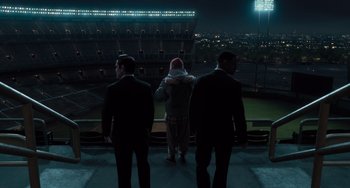 Movie still from “Men in Black 3” (2012), directed by Barry Sonnenfeld – A group of men standing on top of a building; Extreme Wide shot, High angle