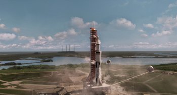 Movie still from “Men in Black 3” (2012), directed by Barry Sonnenfeld – An image of a rocket taking off from the ground; Extreme Wide shot, Overhead angle