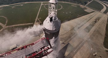 Movie still from “Men in Black 3” (2012), directed by Barry Sonnenfeld – An aerial view of a fire hydrant with smoke billowing out of it; Extreme Wide shot, Overhead angle