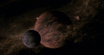 Movie still from “Men in Black II” (2002), directed by Barry Sonnenfeld – An exoplanet and its parent star in the night sky; Extreme Wide shot, Overhead angle