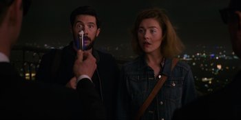 Movie still from “Men in Black: International” (2019), directed by F. Gary Gray – A man and a woman standing next to each other; Close Up shot, Over the shoulder angle