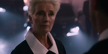Movie still from “Men in Black: International” (2019), directed by F. Gary Gray – An older woman wearing a black and white shirt; Close Up shot, Low angle
