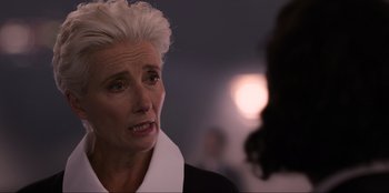 Movie still from “Men in Black: International” (2019), directed by F. Gary Gray – An older woman with white hair talking to a younger woman; Close Up shot, Over the shoulder angle