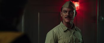 Movie still from “Midway” (2019), directed by Roland Emmerich – A person wearing a uniform; Close Up shot, Low angle