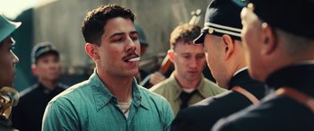 Movie still from “Midway” (2019), directed by Roland Emmerich – A group of men standing next to each other; Close Up shot, Over the shoulder angle