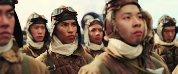 Movie still from “Midway” (2019), directed by Roland Emmerich – A group of men in military uniforms; Close Up shot, Low angle