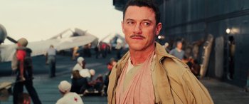 Movie still from “Midway” (2019), directed by Roland Emmerich – A person with a mustache; Close Up shot, Low angle