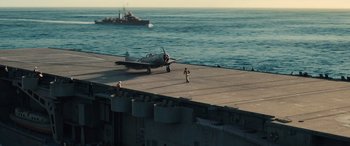 Movie still from “Midway” (2019), directed by Roland Emmerich – An airplane on the deck of an aircraft carrier; Extreme Wide shot, High angle