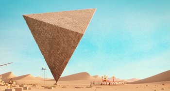 Movie still from “Minions” (2015), directed by Pierre Coffin – An image of a pyramid in the middle of the desert; Extreme Wide shot, Low angle