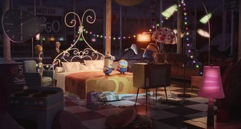 Movie still from “Minions” (2015), directed by Pierre Coffin – An animated bedroom scene with a bed , tv , and a lot of lights; Wide shot, High angle