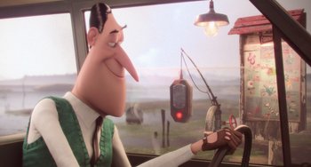 Movie still from “Minions” (2015), directed by Pierre Coffin – A man and a woman are sitting in a car; Medium shot, Over the shoulder angle