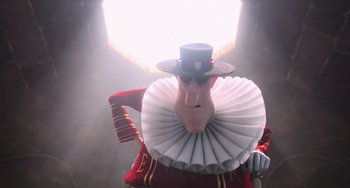 Movie still from “Minions” (2015), directed by Pierre Coffin – A man in a top hat and a red and white outfit; Close Up shot, Low angle