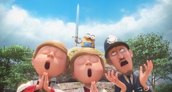 Movie still from “Minions” (2015), directed by Pierre Coffin – A group of people standing next to each other; Medium shot, Low angle