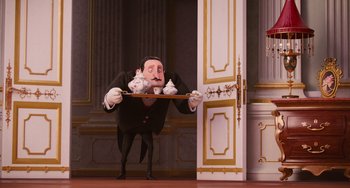 Movie still from “Minions” (2015), directed by Pierre Coffin – A man holding a tray of food in front of a door; Wide shot, Low angle