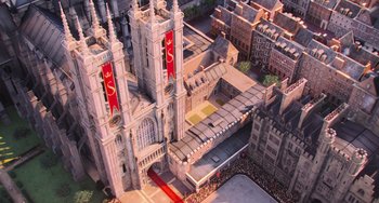 Movie still from “Minions” (2015), directed by Pierre Coffin – An aerial view of a city with a large church; Extreme Wide shot, High angle