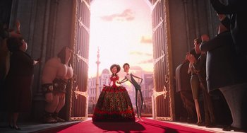 Movie still from “Minions” (2015), directed by Pierre Coffin – A man and a woman standing in front of an open door; Wide shot, Low angle