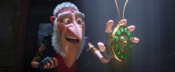 Movie still from “Minions: The Rise of Gru” (2022), directed by Jonathan del Val – A cartoon character with a beard is holding a clock; Medium shot, Overhead angle