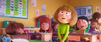 Movie still from “Minions: The Rise of Gru” (2022), directed by Jonathan del Val – A cartoon of a girl and a boy in a classroom; Medium shot, Over the shoulder angle
