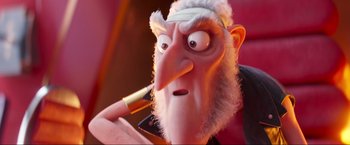 Movie still from “Minions: The Rise of Gru” (2022), directed by Jonathan del Val – An old man with a beard is holding a pipe; Close Up shot, Low angle