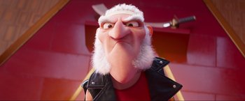 Movie still from “Minions: The Rise of Gru” (2022), directed by Jonathan del Val – An image of an animated character with a beard; Close Up shot, Low angle