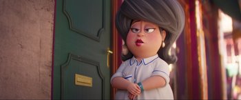 Movie still from “Minions: The Rise of Gru” (2022), directed by Jonathan del Val – An animated character is standing in front of a door; Close Up shot, Over the shoulder angle