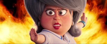 Movie still from “Minions: The Rise of Gru” (2022), directed by Jonathan del Val – An animated woman with a surprised look on her face; Close Up shot, Low angle