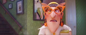 Movie still from “Minions: The Rise of Gru” (2022), directed by Jonathan del Val – A cartoon character wearing orange glasses; Close Up shot, Over the shoulder angle