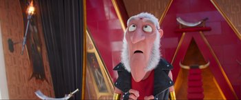 Movie still from “Minions: The Rise of Gru” (2022), directed by Jonathan del Val – An image of an animated character that is looking sad; Close Up shot, Over the shoulder angle