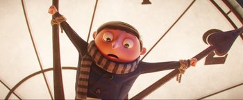 Movie still from “Minions: The Rise of Gru” (2022), directed by Jonathan del Val – An animated character with a surprised look on his face; Medium shot, Low angle