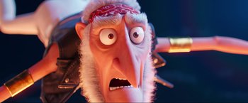 Movie still from “Minions: The Rise of Gru” (2022), directed by Jonathan del Val – An animated character with an angry look on his face; Close Up shot, Low angle