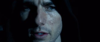 Movie still from “Minority Report” (2002), directed by Steven Spielberg – A man's face in the dark; Extreme Close Up shot, Over the shoulder angle