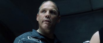 Movie still from “Minority Report” (2002), directed by Steven Spielberg – A person wearing a uniform; Close Up shot, Low angle