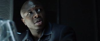 Movie still from “Minority Report” (2002), directed by Steven Spielberg – A person with a black shirt; Close Up shot, Low angle