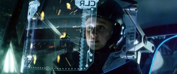 Movie still from “Minority Report” (2002), directed by Steven Spielberg – A woman wearing a helmet looking out of a window; Close Up shot, Over the shoulder angle