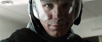 Movie still from “Minority Report” (2002), directed by Steven Spielberg – A person wearing a helmet; Close Up shot, Overhead angle