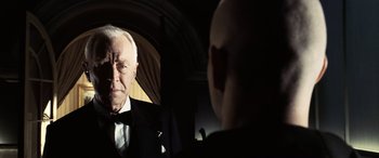 Movie still from “Minority Report” (2002), directed by Steven Spielberg – An older man looking at himself in the mirror; Close Up shot, Over the shoulder angle